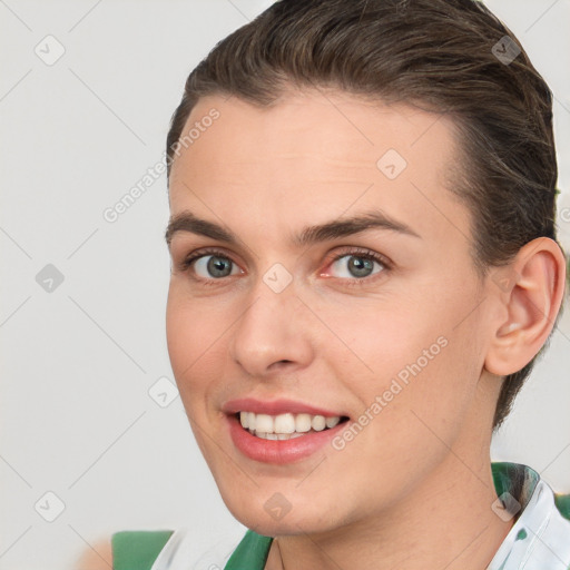 Joyful white young-adult female with short  brown hair and brown eyes