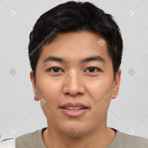 Joyful asian young-adult male with short  black hair and brown eyes