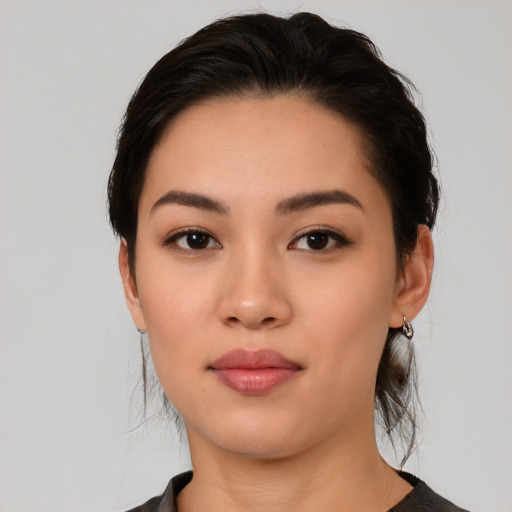 Neutral white young-adult female with medium  black hair and brown eyes