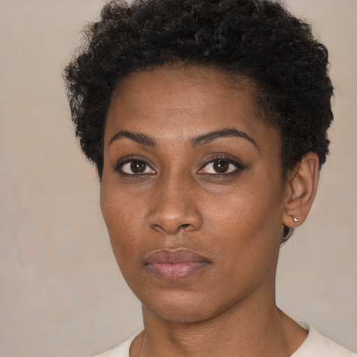 Neutral black young-adult female with short  brown hair and brown eyes