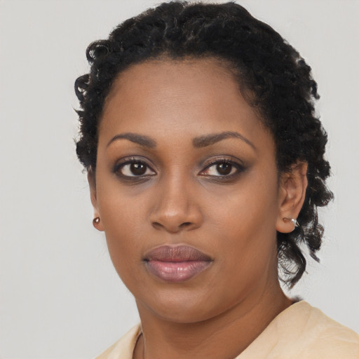 Neutral black young-adult female with long  black hair and brown eyes
