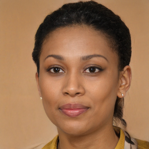 Joyful latino young-adult female with short  brown hair and brown eyes
