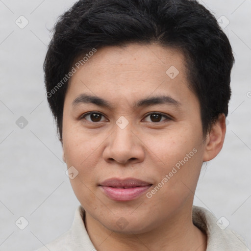 Joyful asian young-adult male with short  brown hair and brown eyes