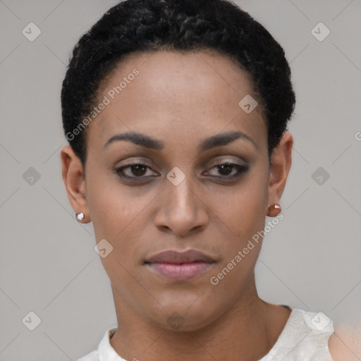 Joyful black young-adult female with short  black hair and brown eyes