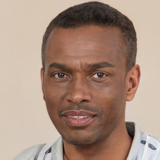 Neutral black young-adult male with short  brown hair and brown eyes