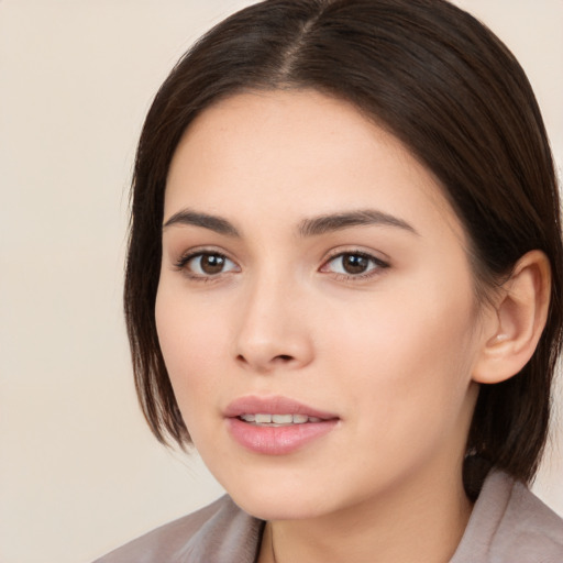 Neutral white young-adult female with medium  brown hair and brown eyes