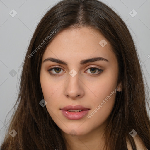 Neutral white young-adult female with long  brown hair and brown eyes