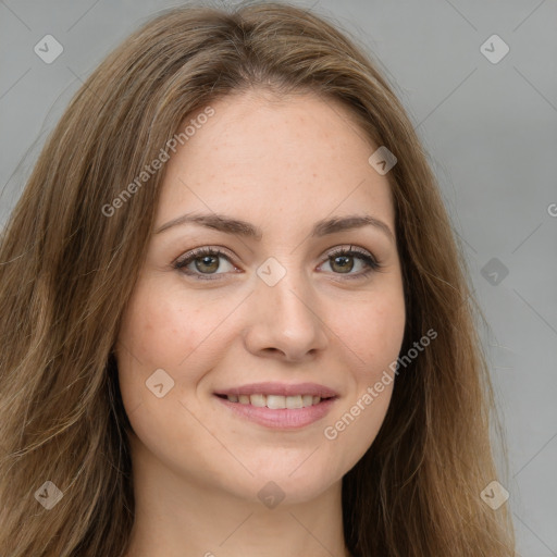 Joyful white young-adult female with long  brown hair and green eyes