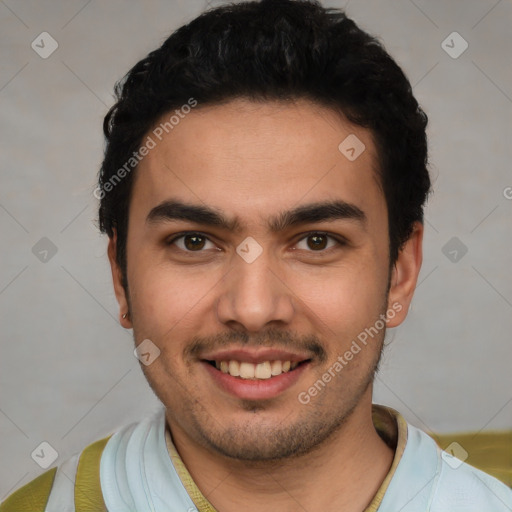 Joyful white young-adult male with short  black hair and brown eyes