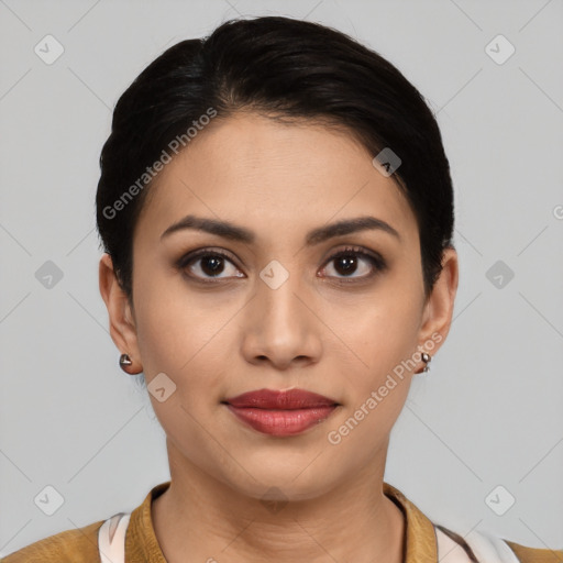 Joyful latino young-adult female with short  black hair and brown eyes