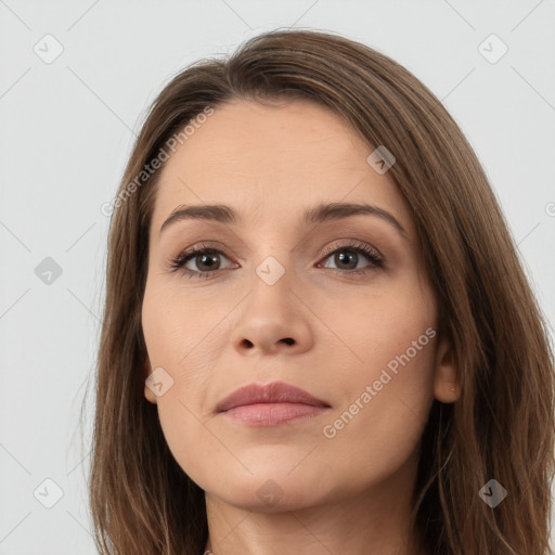 Neutral white young-adult female with long  brown hair and brown eyes