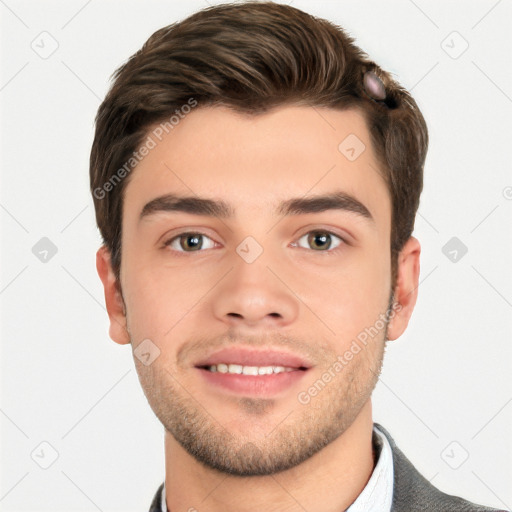 Joyful white young-adult male with short  brown hair and grey eyes