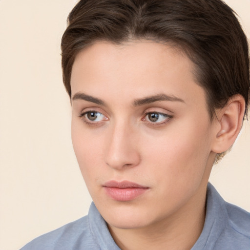 Neutral white young-adult female with medium  brown hair and brown eyes