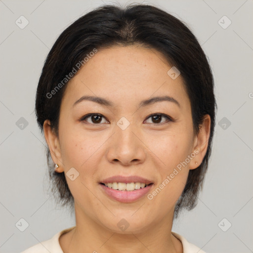 Joyful white adult female with medium  brown hair and brown eyes