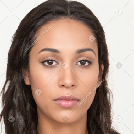 Neutral latino young-adult female with long  brown hair and brown eyes