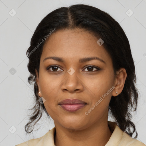 Joyful black young-adult female with medium  brown hair and brown eyes