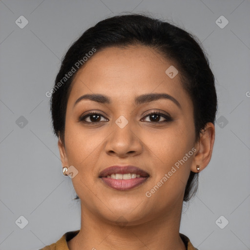 Joyful latino young-adult female with medium  brown hair and brown eyes
