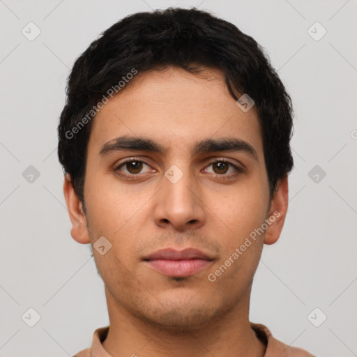 Neutral latino young-adult male with short  black hair and brown eyes