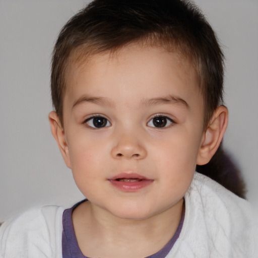 Joyful white child female with short  brown hair and brown eyes