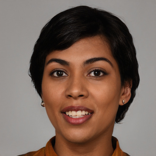 Joyful latino young-adult female with medium  black hair and brown eyes