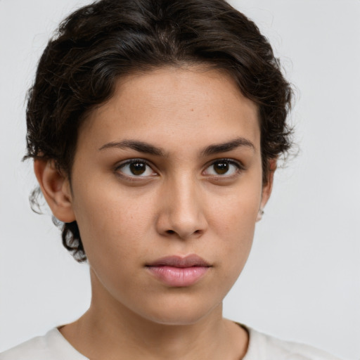 Neutral white young-adult female with short  brown hair and brown eyes