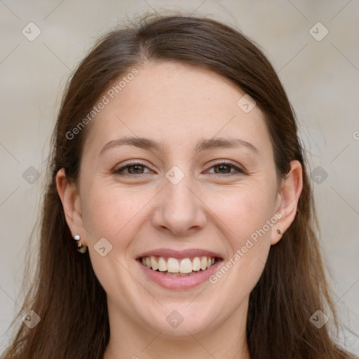 Joyful white young-adult female with long  brown hair and grey eyes