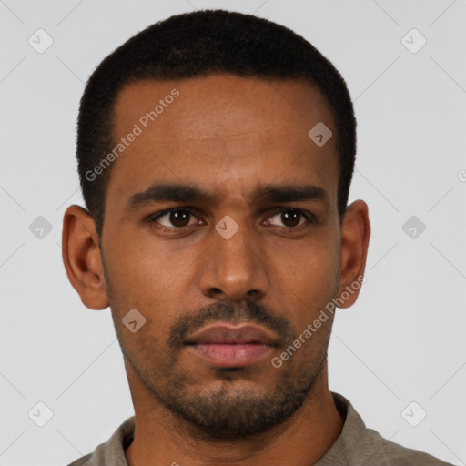 Neutral latino young-adult male with short  black hair and brown eyes