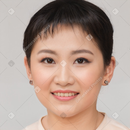 Joyful asian young-adult female with short  brown hair and brown eyes