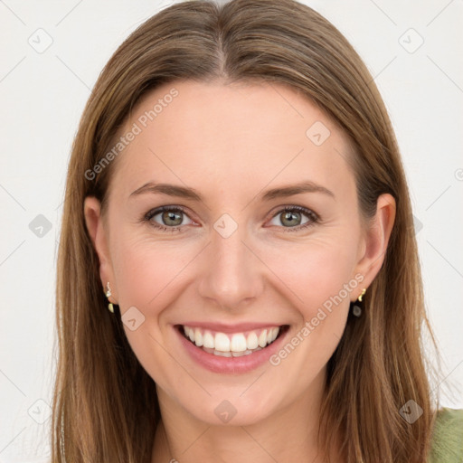 Joyful white young-adult female with long  brown hair and green eyes