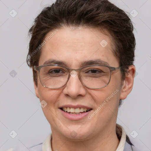 Joyful white adult female with short  brown hair and brown eyes