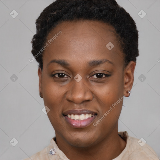 Joyful black young-adult female with short  black hair and brown eyes