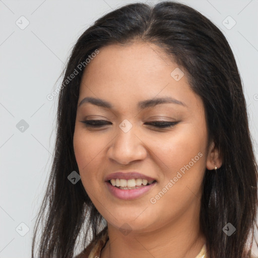 Joyful latino young-adult female with long  brown hair and brown eyes