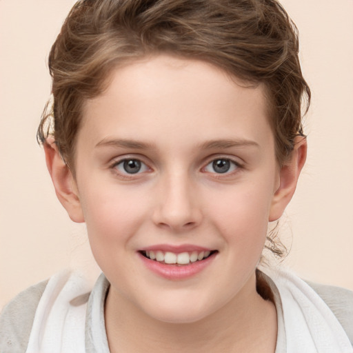 Joyful white child female with short  brown hair and brown eyes