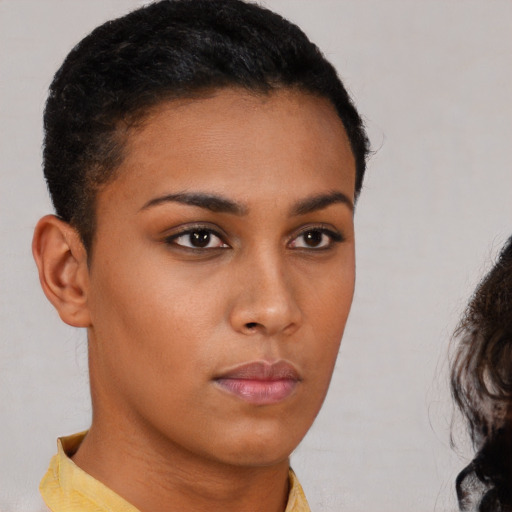 Neutral latino young-adult female with short  brown hair and brown eyes