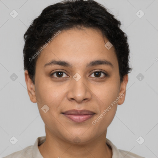 Joyful latino young-adult female with short  brown hair and brown eyes