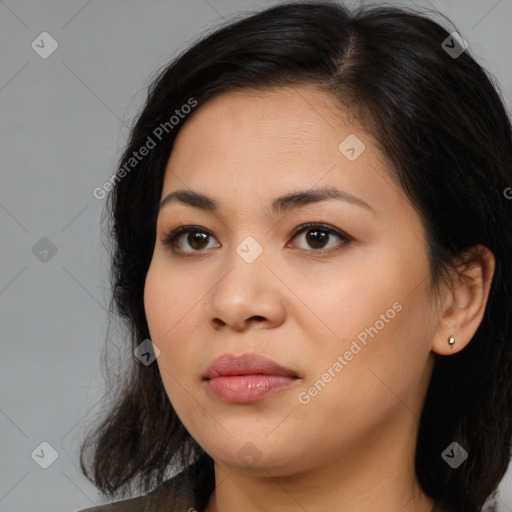 Joyful asian young-adult female with medium  black hair and brown eyes