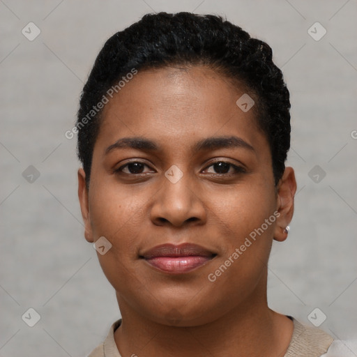 Joyful black young-adult female with short  brown hair and brown eyes