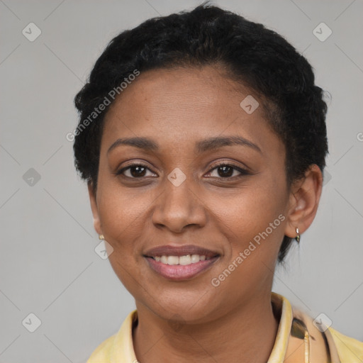 Joyful latino young-adult female with short  brown hair and brown eyes