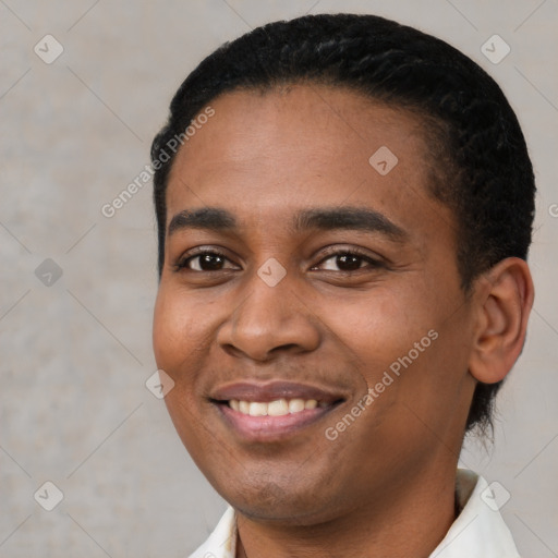 Joyful latino young-adult male with short  black hair and brown eyes