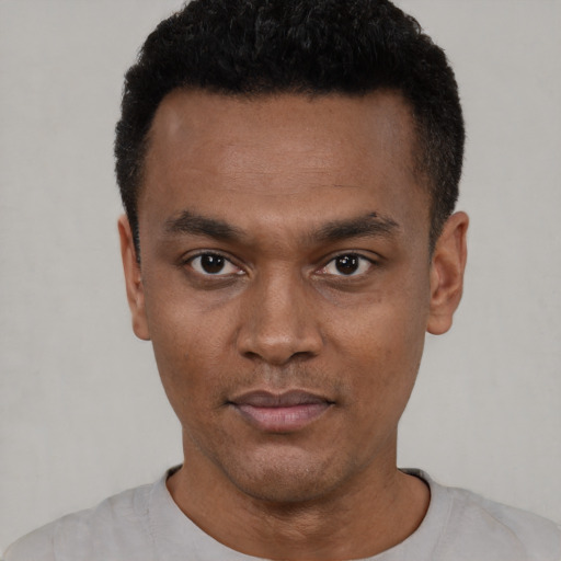 Neutral black young-adult male with short  black hair and brown eyes