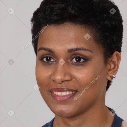 Joyful black young-adult female with short  brown hair and brown eyes