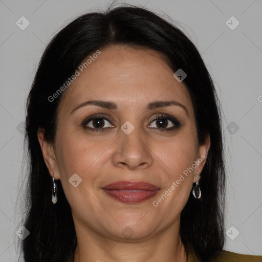 Joyful white adult female with long  brown hair and brown eyes