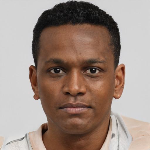 Neutral black young-adult male with short  brown hair and brown eyes