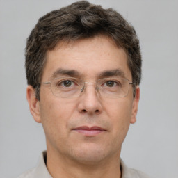 Neutral white adult male with short  brown hair and brown eyes
