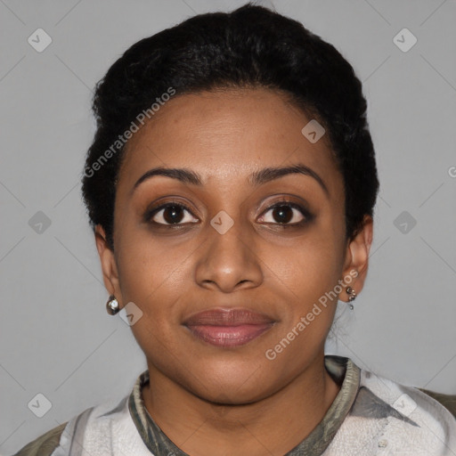 Joyful black young-adult female with short  black hair and brown eyes