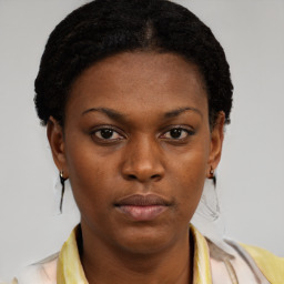 Neutral black young-adult female with short  brown hair and brown eyes