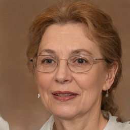 Joyful white middle-aged female with medium  brown hair and brown eyes