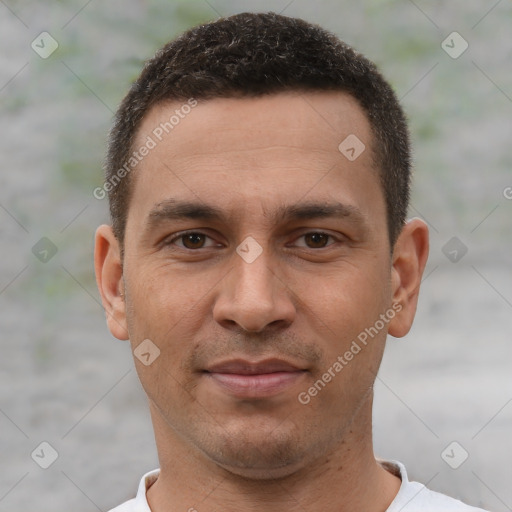 Joyful white young-adult male with short  brown hair and brown eyes