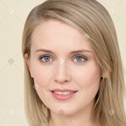 Joyful white young-adult female with long  brown hair and blue eyes