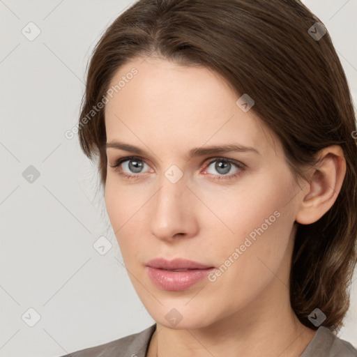 Neutral white young-adult female with medium  brown hair and grey eyes